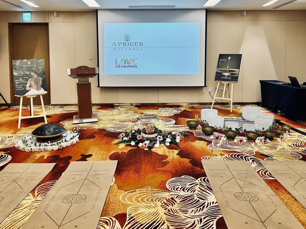 A company wellness session set up in a hotel function room