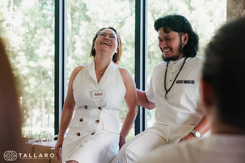 Mai laughing with Teacher Ian during integration